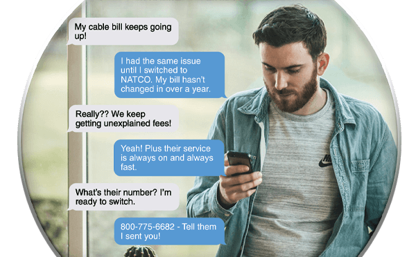 Man looking at cell phone with text message conversation