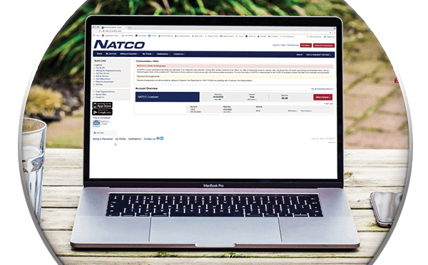 Laptop screen mockup showing NATCO SmartHub