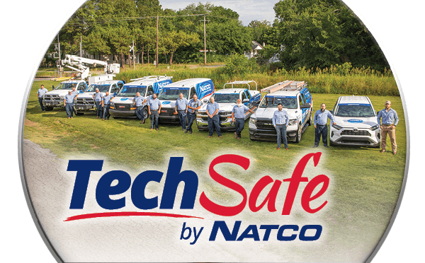 NATCO techs standing by services vehicles