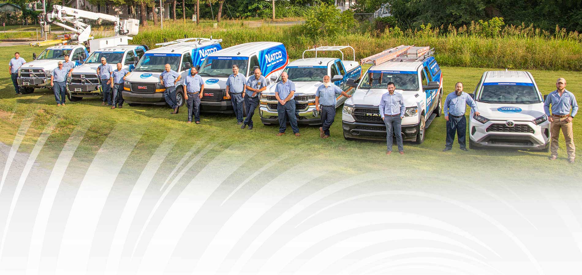 NATCO techs standing by services vehicles