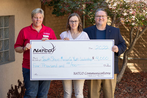 NATCO representatives, President & General Manager, Steven Sanders, Jr. (right) and Kayla Stafford (center) presented Billie Collins (left) with a grant of ,000 to support the South Shore Marion County Youth Leadership Program.
